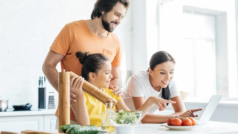 Family using maths while cooking together as part of everyday learning at home.