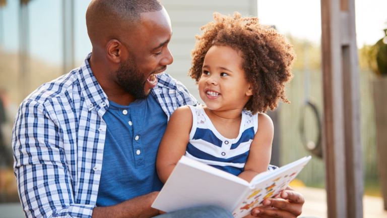 Parent supporting their child with schoolwork at home.
